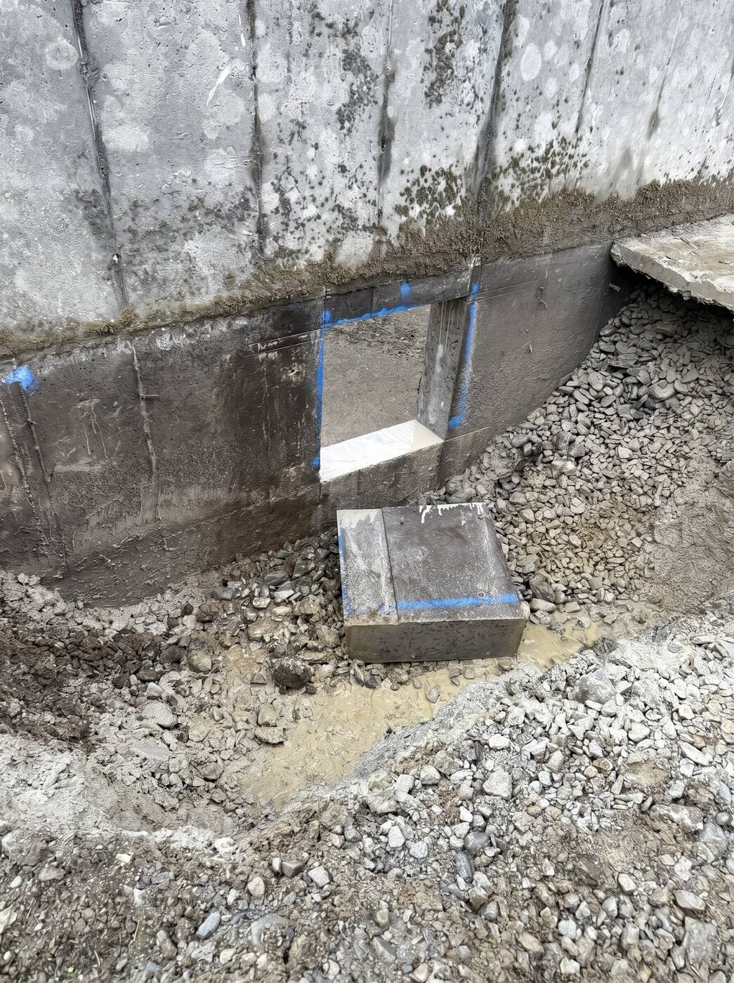 A concrete section saw-cut and lifted free of the surrounding structure on site